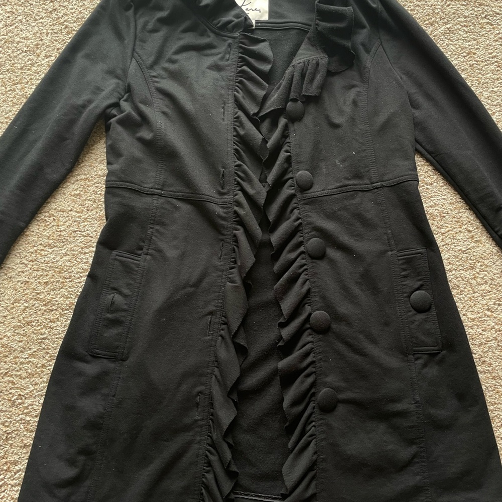 Long black frilly vintage coat